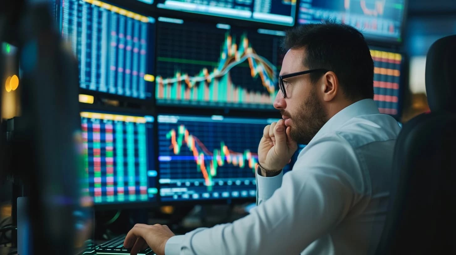 Trader analyzing performance dashboard on TradeJora